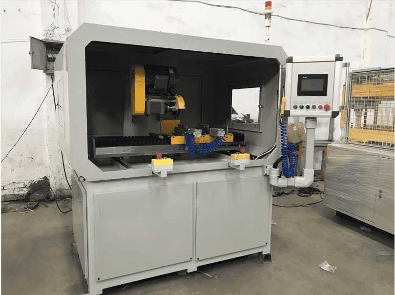 Manifold tube baffle auto slotting machine